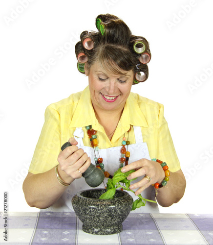 Housewife Crushing Herbs photo