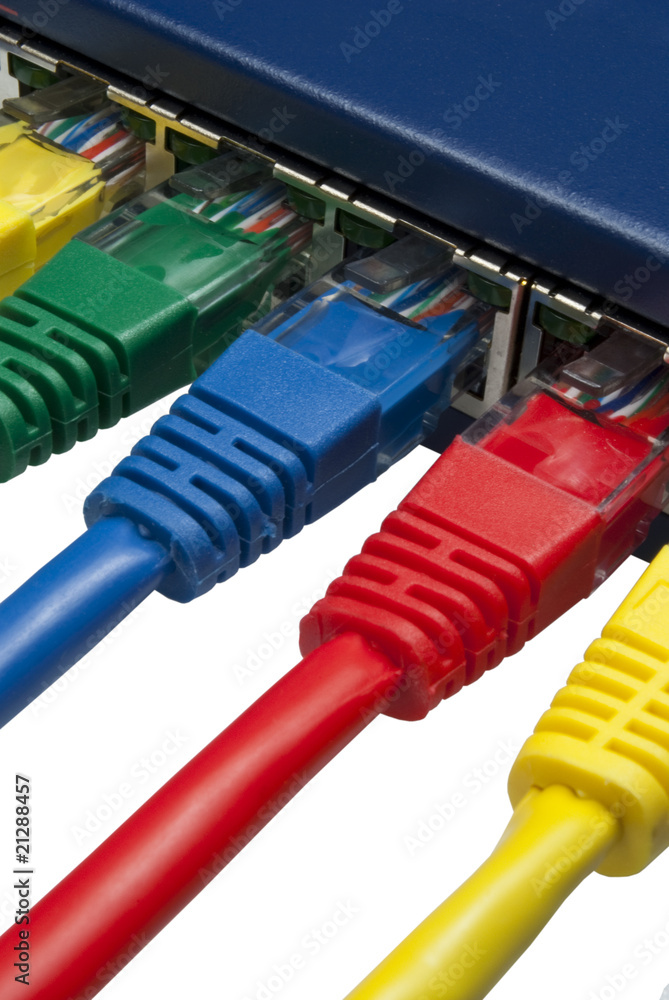 Multi coloured ethernet network plugs connected to a router