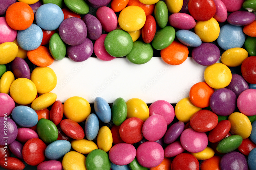 Colorful sweets with blank white label in the middle Colorful sweets with blank white label in the middle