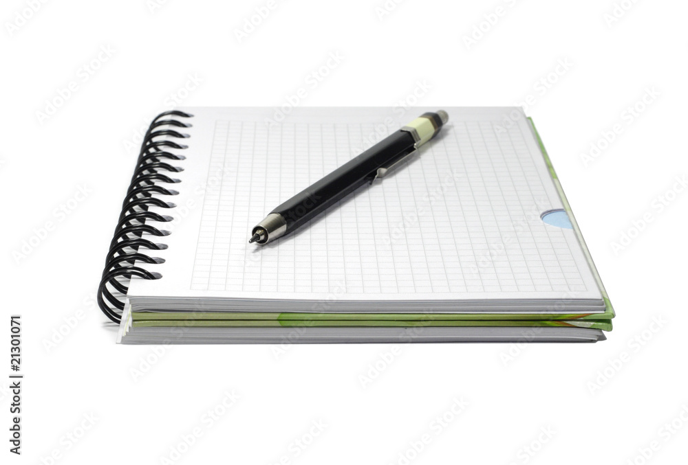 Notebook and black mecanical pencil isolated on white Notebook and black mecanical pencil isolated on white