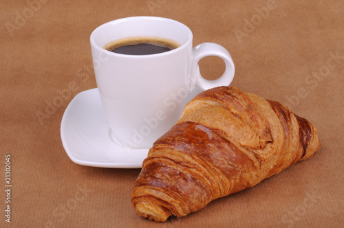 Black coffee and croissant