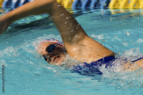 woman swimming in pool (close-up)