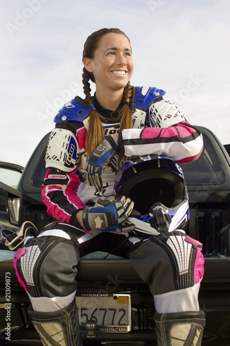 female motocross racer outdoors