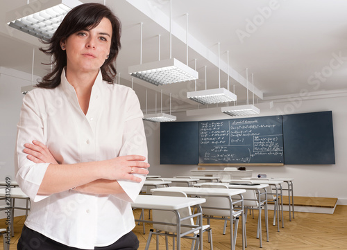 Attractive teacher in class...