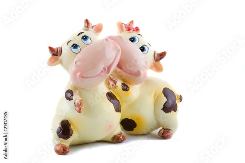 Two ceramic cows.