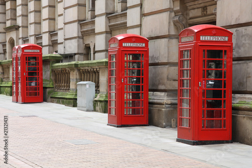 Birmingham red telephone boxes. England.