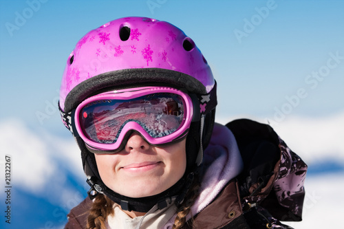 Girl in ski helmet smiling