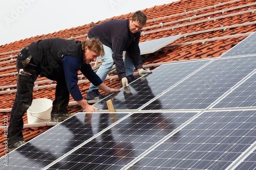 installing solar modules on a roof 06 photo