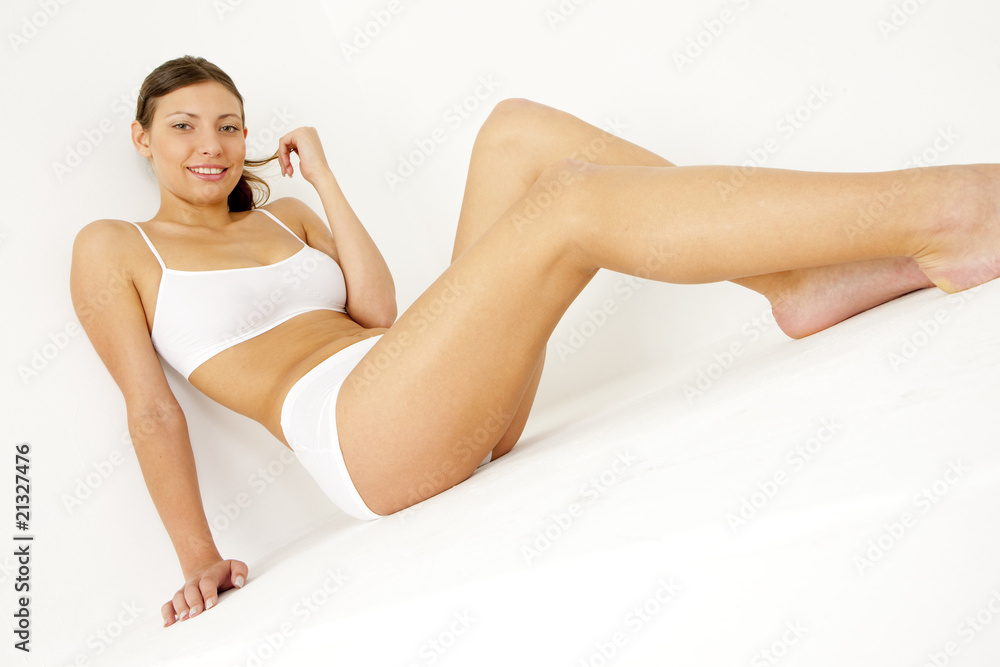 Fototapeta premium sitting young woman wearing lingerie