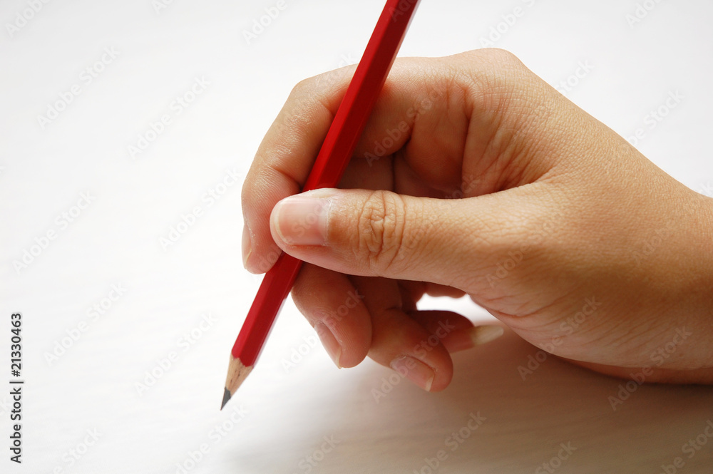 close up of hand with pencil with white background close up of hand with pencil with white background
