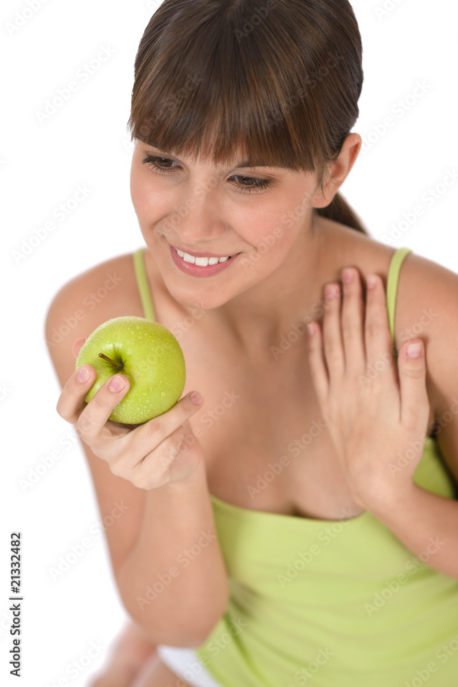 Happy female teenager with healthy apple Happy female teenager with healthy apple