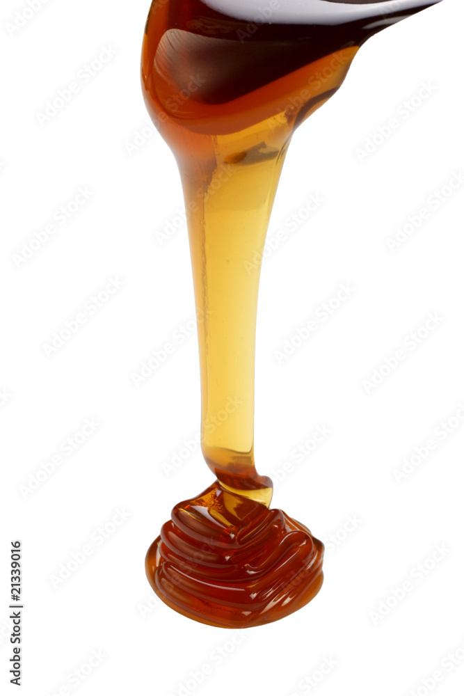 Honey leaking on ground isolated on white background Honey leaking on ground isolated on white background