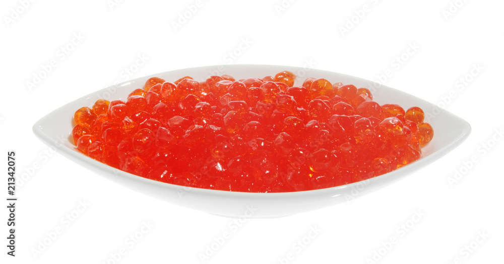 Red caviar in a white plate. (salmon)