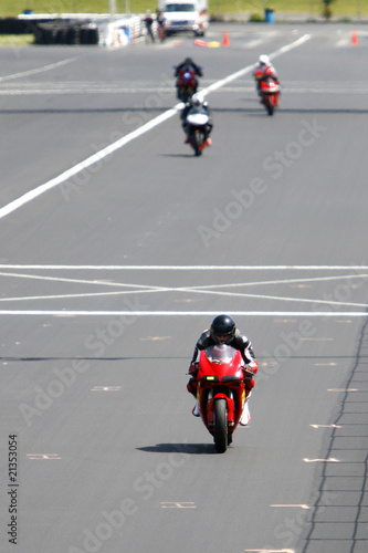 Motorcycles on a track.