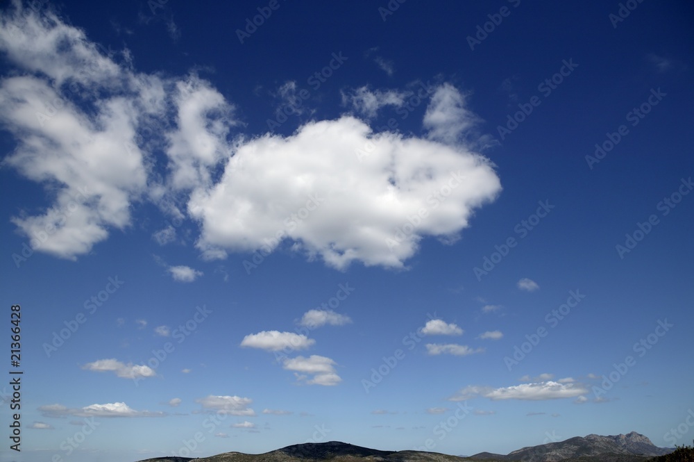 Fototapeta premium Blue sky white clouds in a summer clean day, nature