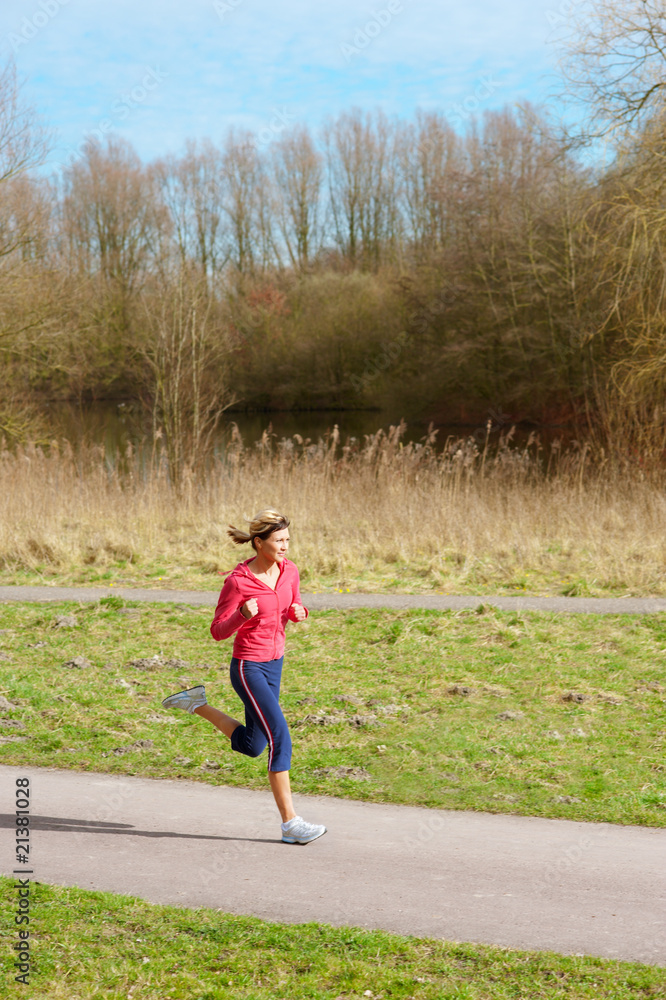 Lady Jogging in a Park Lady Jogging in a Park