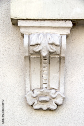 White corbel with floral pattern