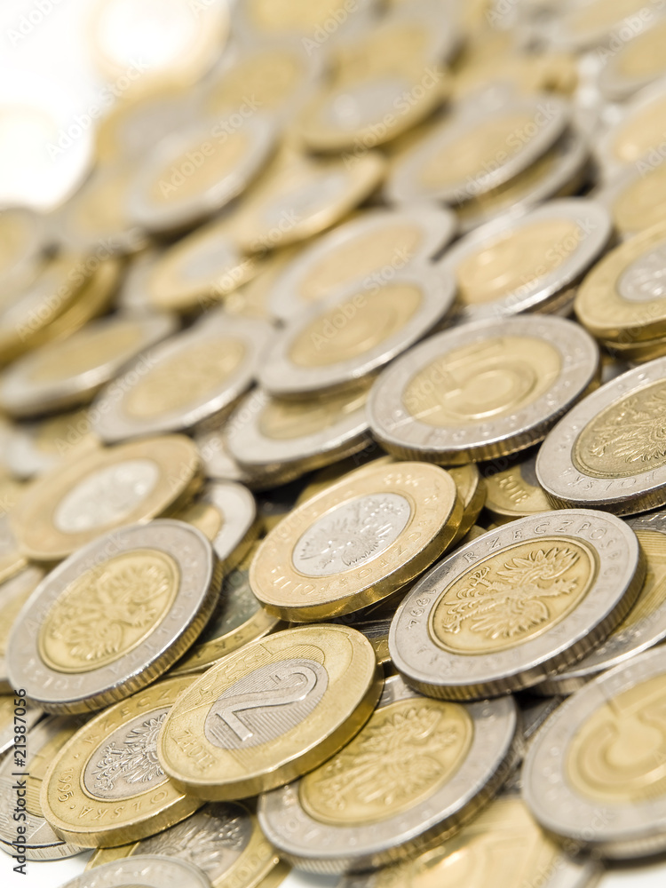 Scattered polish coins. Shallow DOF. Focus on 2. Scattered polish coins. Shallow DOF. Focus on 2.