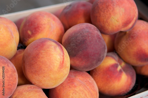 Fresh juicy peaches in the box