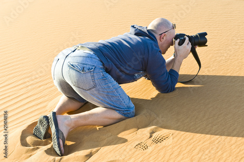Young male photographer taking photographs