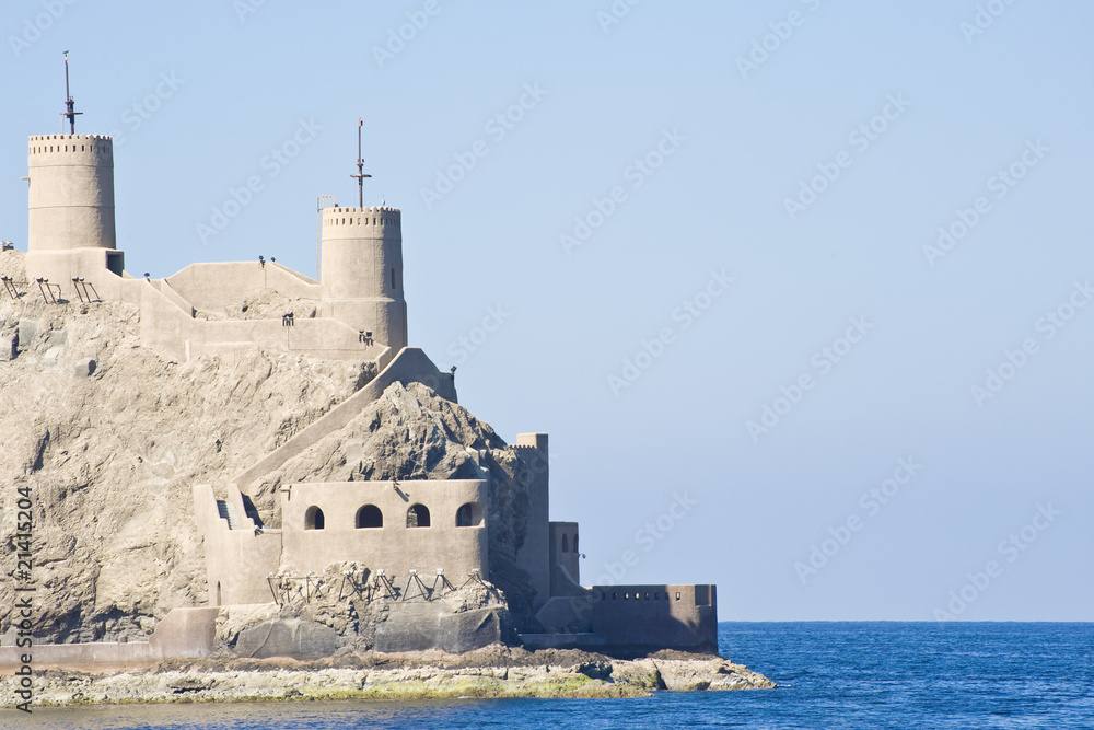 Fortified building overlooking Muttrah harbor Muscat
