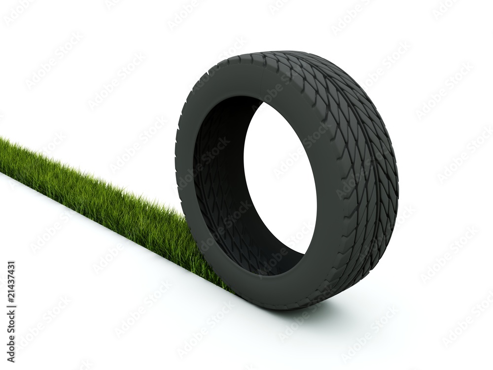 Tire with track from grass isolated on white