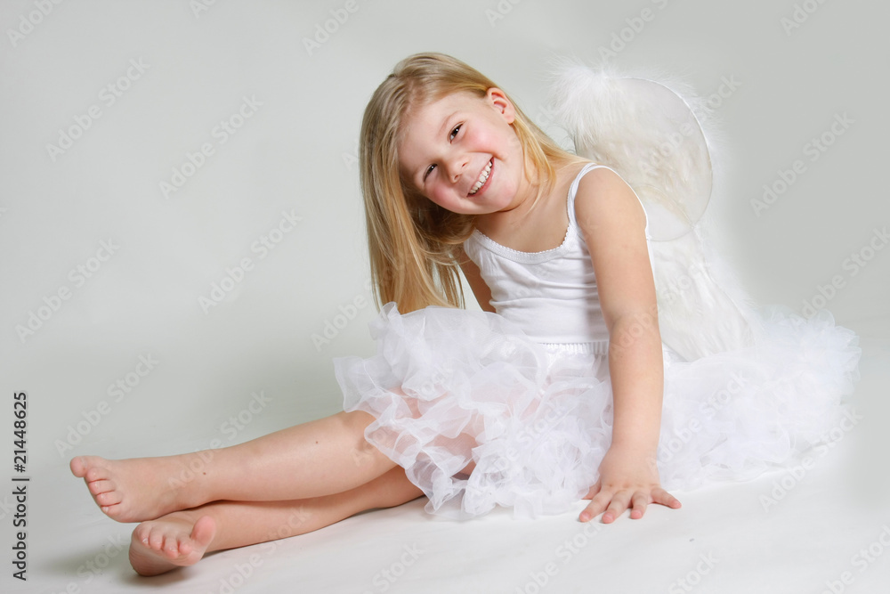 studio shot of little smiling angel girl studio shot of little smiling angel girl