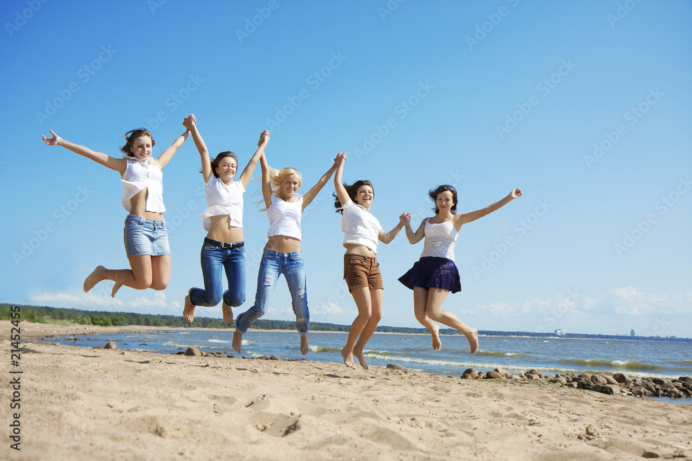 Group of people relaxing on the beach Group of people relaxing on the beach