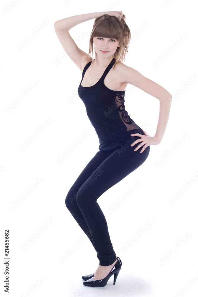Lovely woman in black clothing posing over white background Lovely woman in black clothing posing over white background