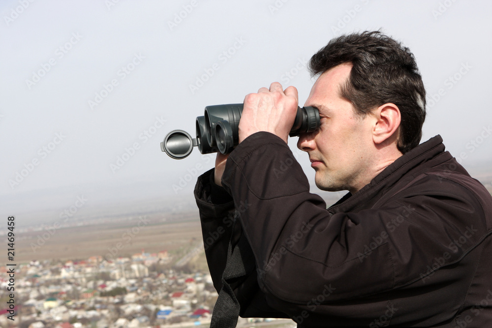Man with binoculars Man with binoculars