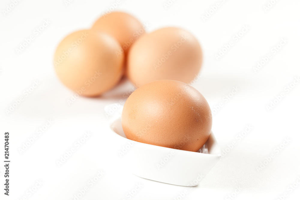 Fototapeta premium raw brown egg isolated