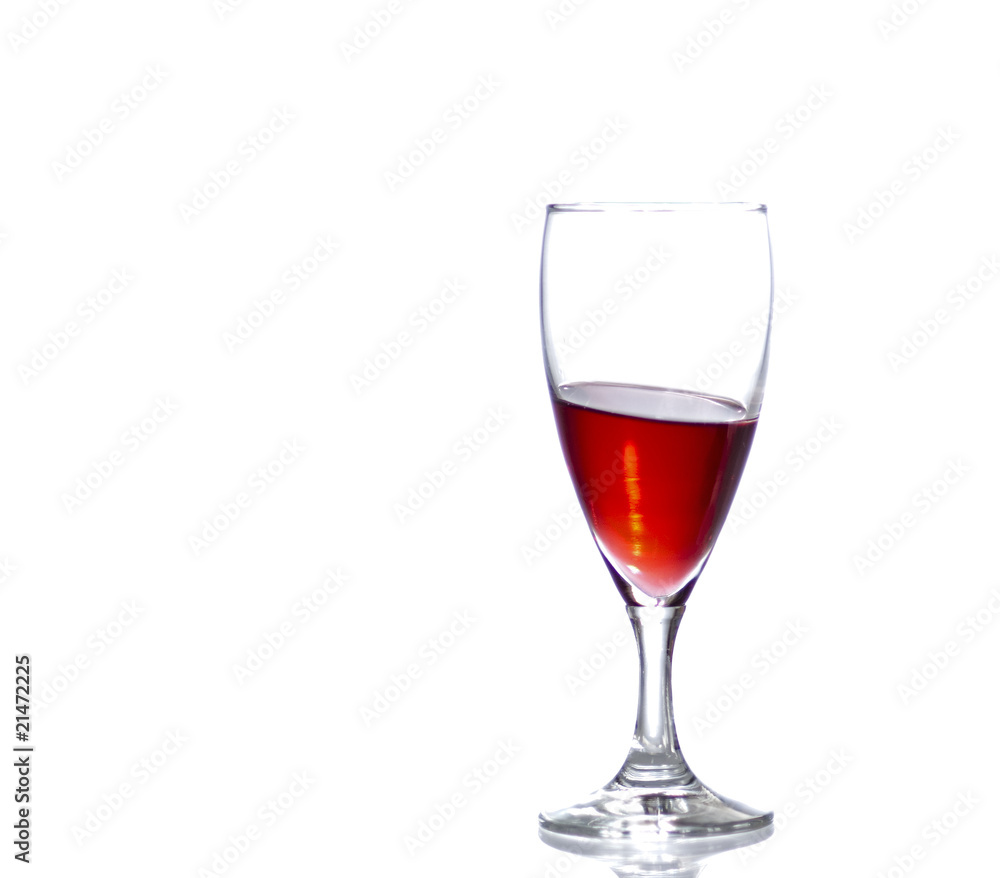 Wineglass on a sloping surface with copy space. Wineglass on a sloping surface with copy space.
