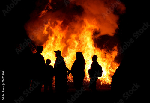 People at a bonfire