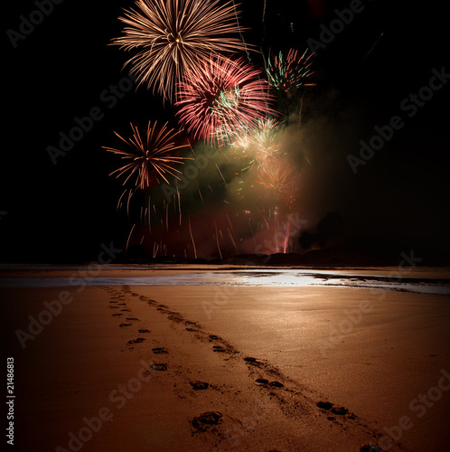 Night time celebration with prints in the sand