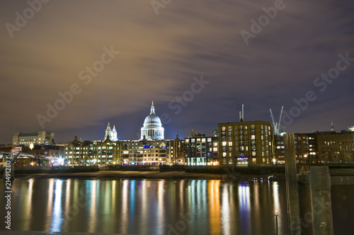 St Paul's Cathedral by night on the thames - London - UK