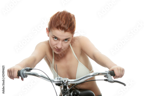 Attractive redhead woman with bike