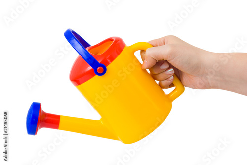 Hand with watering can