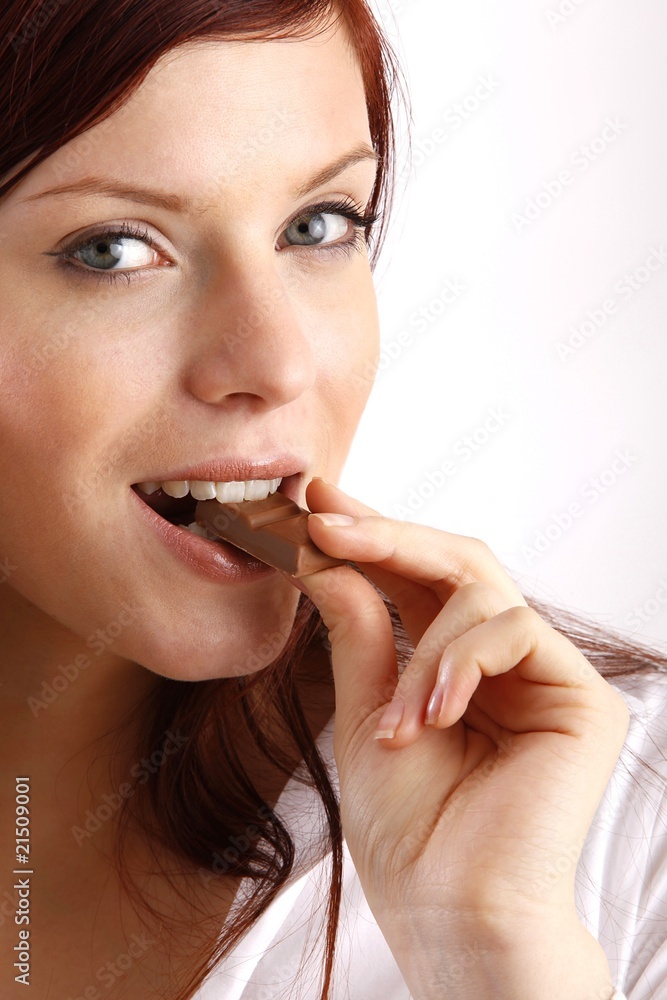 beautiful young woman with a bar of chocolate beautiful young woman with a bar of chocolate