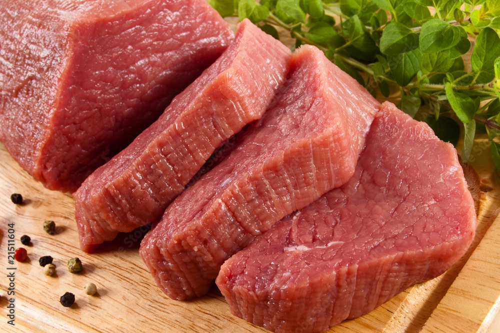 Raw beef on cutting board Raw beef on cutting board