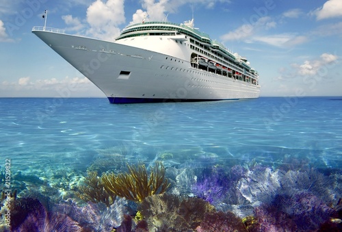 caribbean reef view with cuise vacation boat