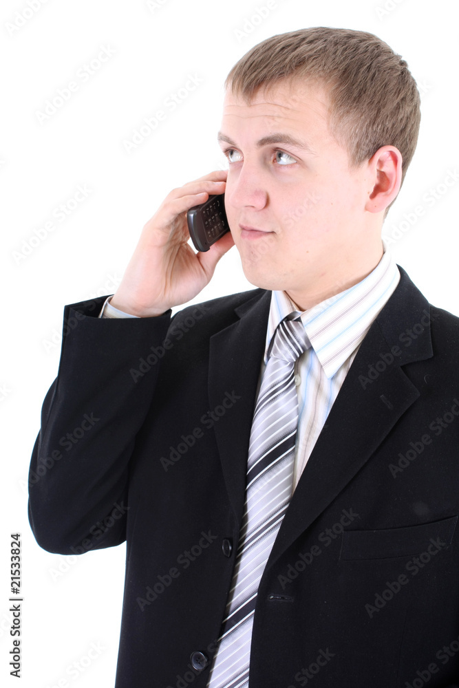 Young businessman in black suit with phone Young businessman in black suit with phone