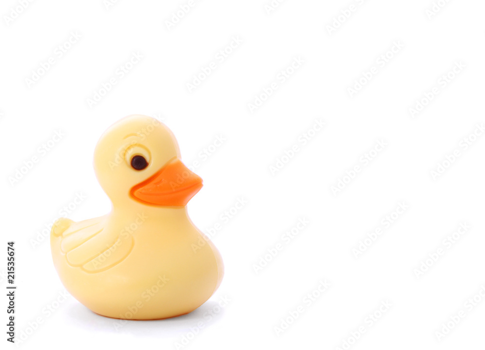 Fototapeta premium Yellow toy duck isolated on white