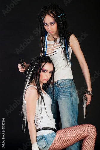 two girls with guns