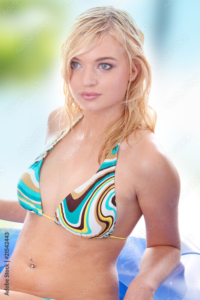 Blond warm woman in bikini