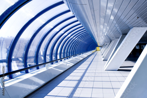 Diminishing hall inside airport in cosmic style
