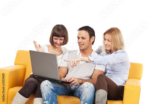 Amused young people with laptop computer