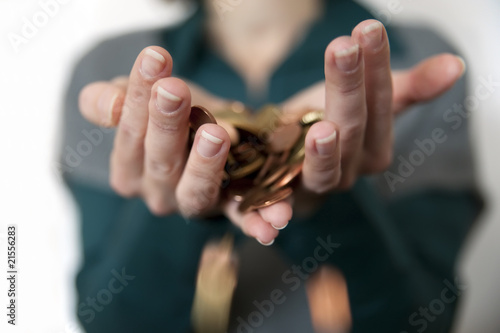 Hände mit Münzen