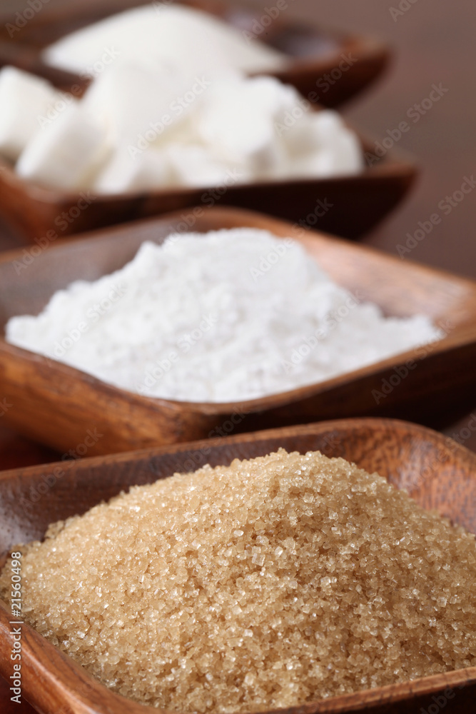 Sugar in wooden bowls