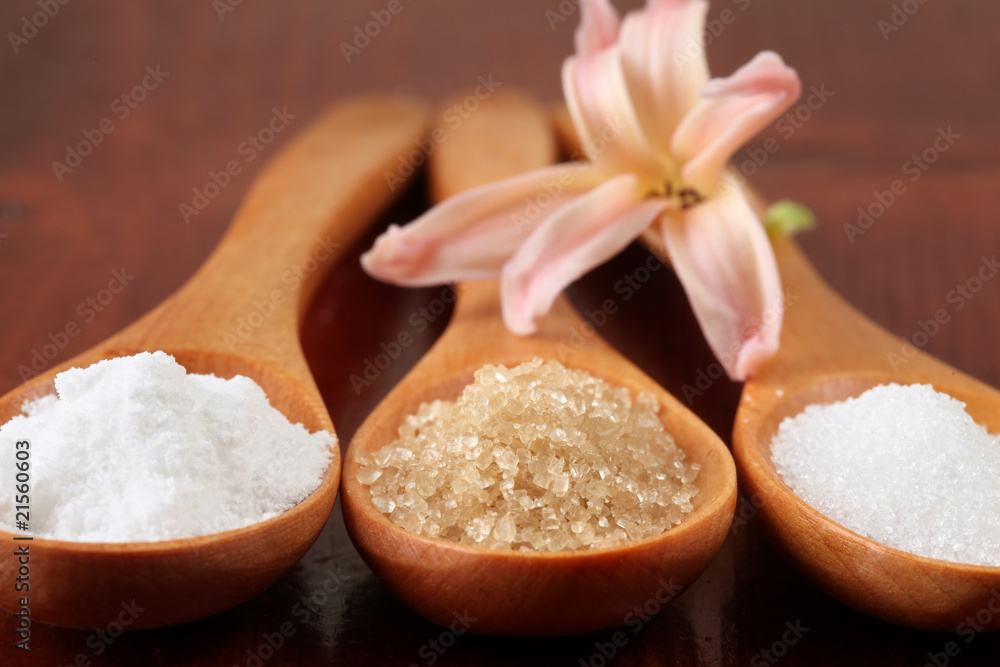 Sugar in wooden spoons Sugar in wooden spoons