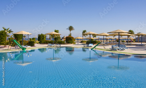 Swimming pool on a sunny day. Hurghada city in Egypt.